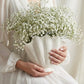 handmade white ceramic vase with sculptural seashell design for modern interiors