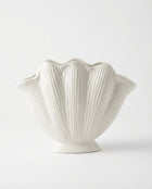 modern white ceramic decorative vases styled on a console table