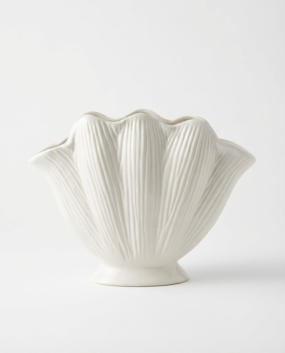 modern white ceramic decorative vases styled on a console table